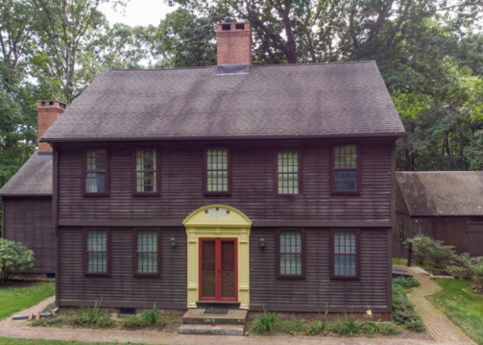 Lt. Elisha Root House
1763
The Lt. Elisha Rcot House, originally built in 1763, was disassembled, relocated on it's
current site in 1986. It tcok crattsmen 2 years to complete this museum quality restoration of  the historic home of a CT Revolutionary War officer. Historic archita:tural features include the rare front entrance, one of only 3 like it in New England and 3 oversized for the period, Bedrooms,  Front Parlor, wide board floors, extensive moldings, 4 fireplaces and elaborate detail and beautiful  built-ins  are indications of the stature of the original owner. 
Traditional rooms for the periods land owners are also present,  Keeping Room, Borning Room, and Buttery. There is the traditional coffin door in the dining room. modern utilities were installed throughout including an addition built in the same methods and tradition as the original. This addition provided the extra space for the modern kitchen pictured.